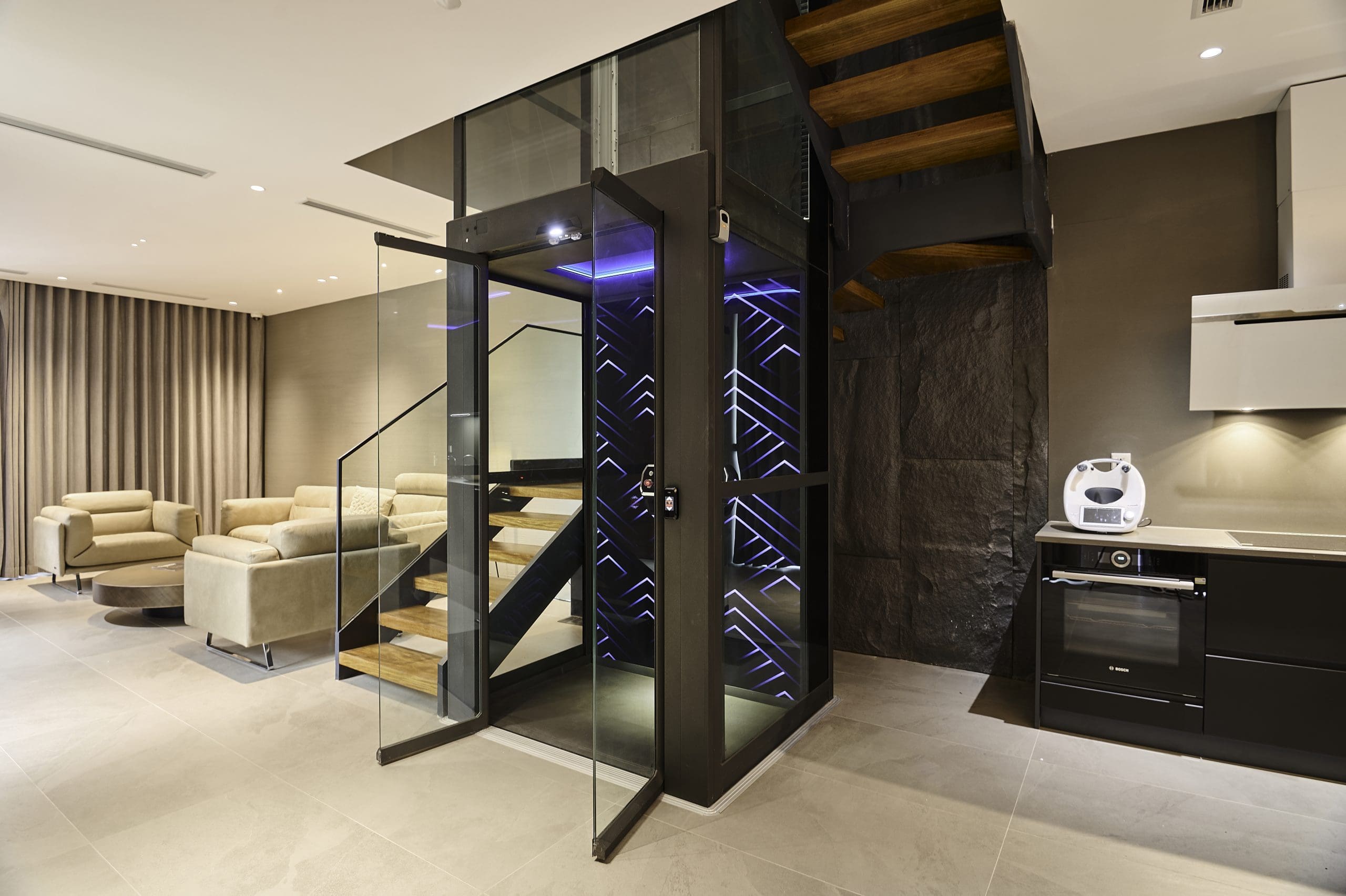 Cibes V90 Galaxy elegantly installed in the center of a staircase