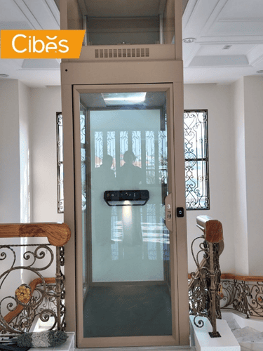 Home elevator cost table with electricity, maintenance, parts, and total.