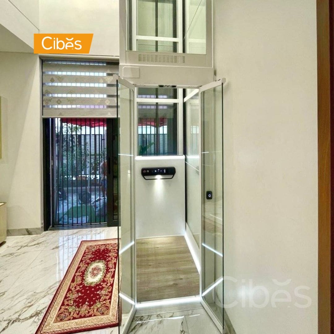 Cibes pitless home elevator with a glass shaft installed inside a modern home.